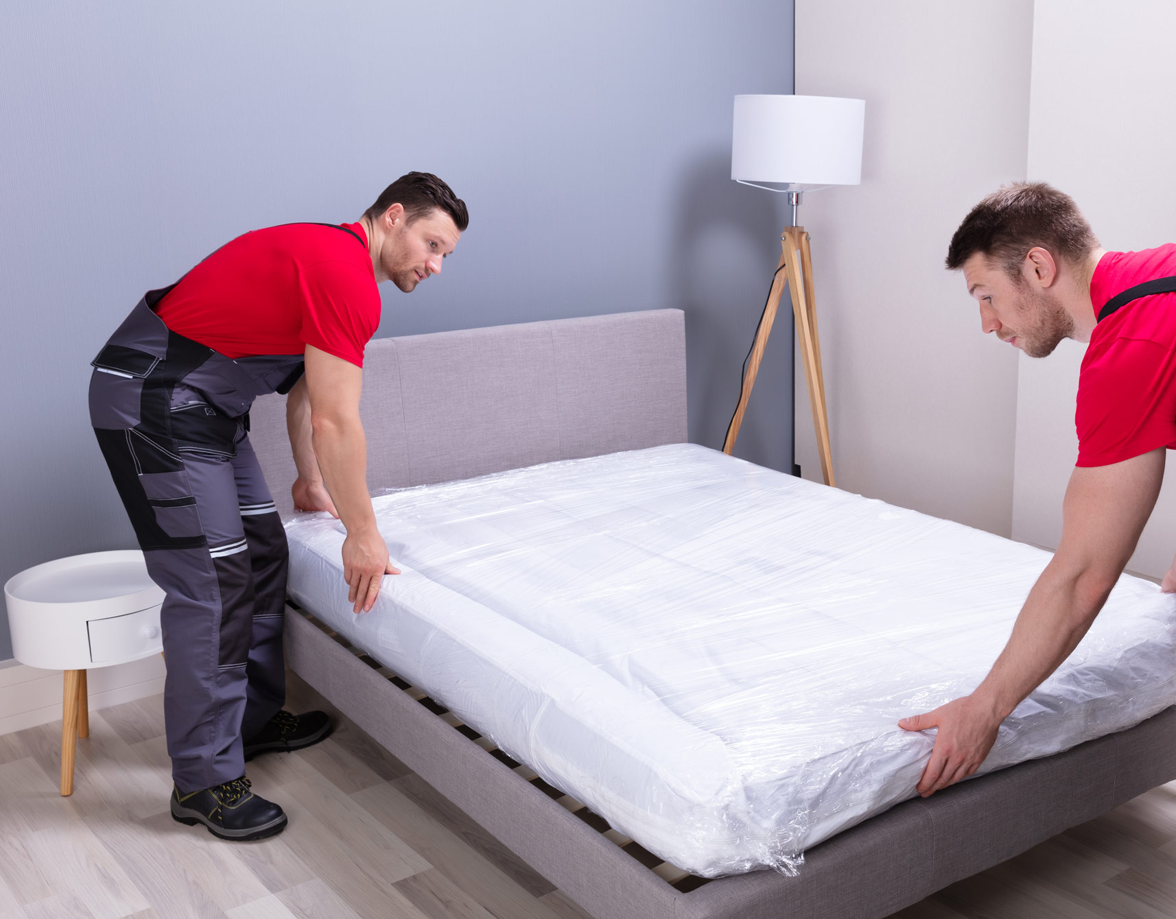 men moving mattress